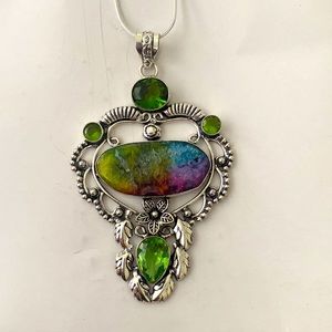 Beautiful, new 3 inch rainbow solar quartz  and green peridot. Silver pendant